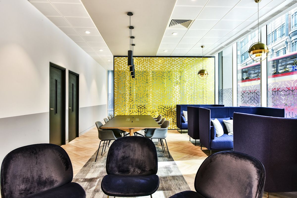 Modern office space at 288 Bishopsgate, London, with contemporary furniture and geometric decor.
