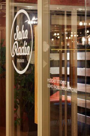 Entrance of Soho Radio Studios at 33 Broadwick Street, London, with visible signage for podcast studios and productions.