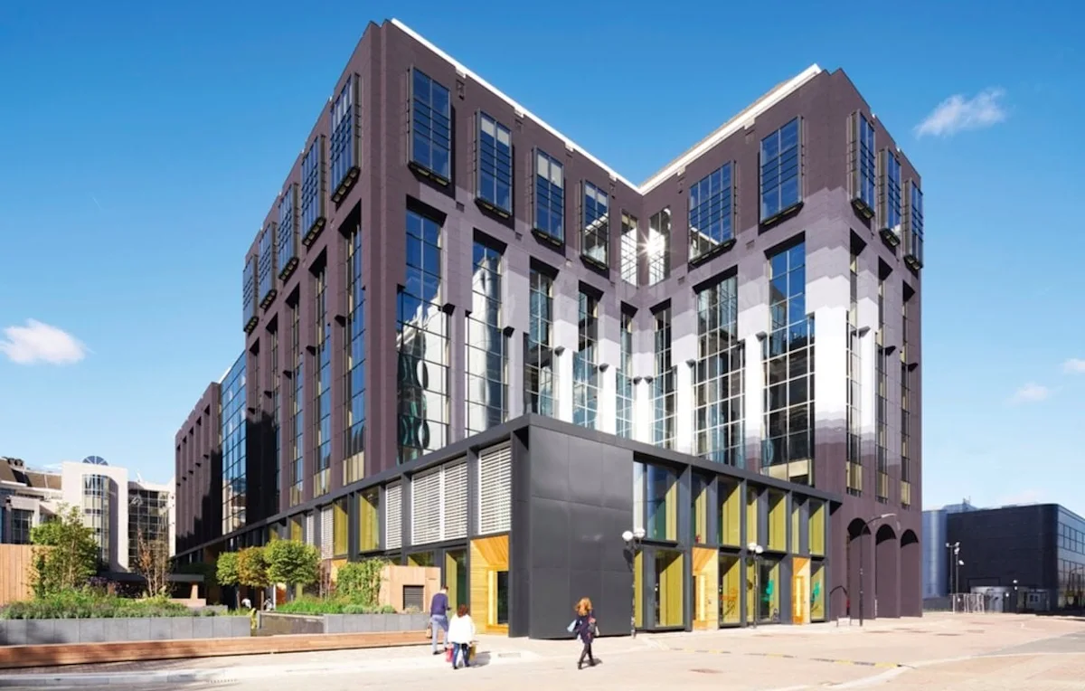 Modern office building at Clove Crescent, London, with glass façade and distinct architecture.