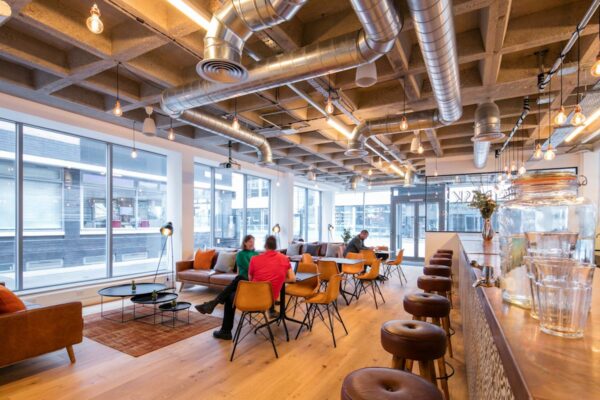 Modern café interior with industrial design elements on Curtain Road, London.