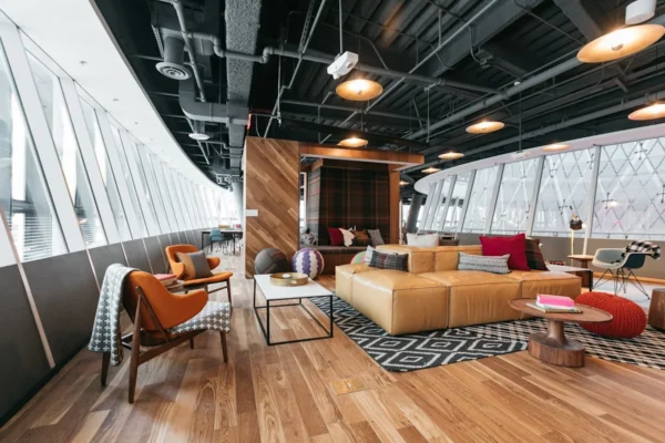 A modern and stylish office lounge area in Devonshire Square 10, London, featuring leather seating and contemporary decor.