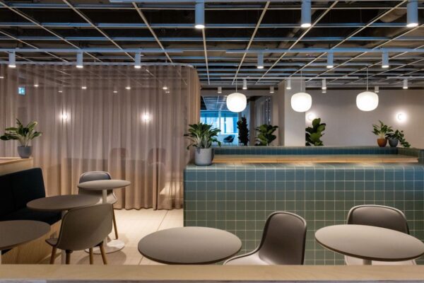 Modern interior seating area at Marsh Wall 77 London with plants and minimalist decor.
