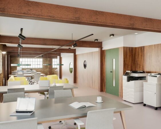 A modern, open-plan office space with desks, chairs, and a photocopier in New Inn Yard, London.