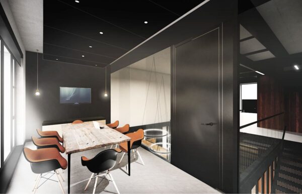 Modern meeting room with a wooden table, orange chairs, and a wall-mounted TV.
