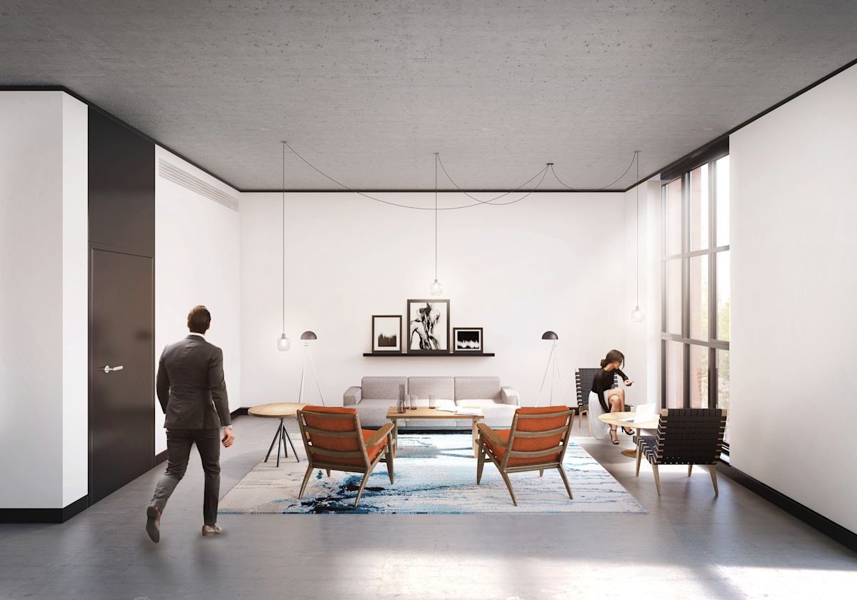 A modern office lounge on Phipp Street, London, with minimalistic furniture and large windows.