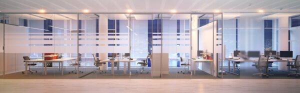 Modern office space with glass partitions and multiple workstations at Scrutton Street, London.
