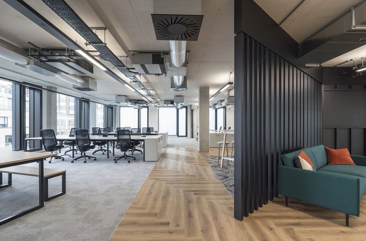 Modern office interior in Shoreditch High Street, London, featuring open workspaces and contemporary furniture.